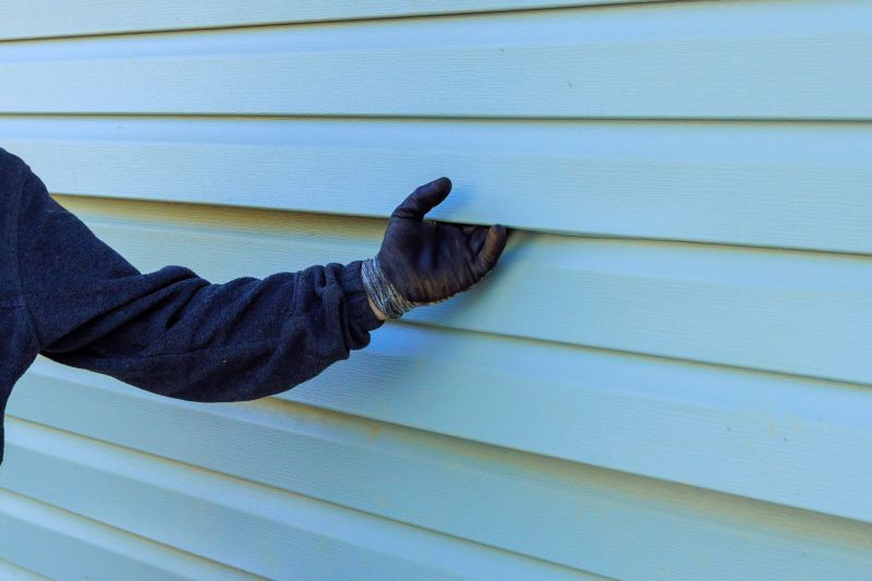 Inspecting Repaired Vinyl Siding